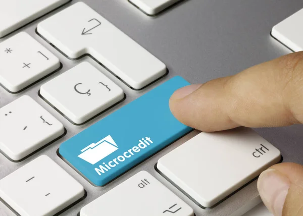 Microcredit Written Blue Key Metallic Keyboard Finger Pressing Key — Stock Photo, Image
