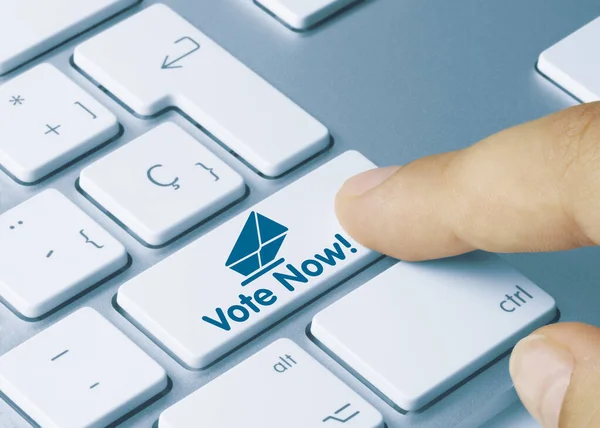 Vote Now Written Blue Key Metallic Keyboard Finger Pressing Key — Stock Photo, Image