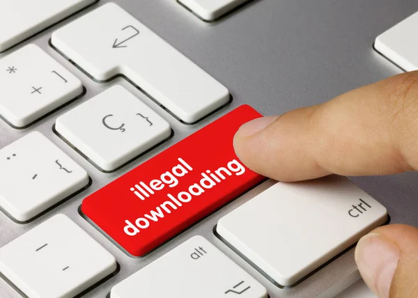 Illegal Downloading Written Red Key Metallic Keyboard Finger Pressing Key — Stock Photo, Image