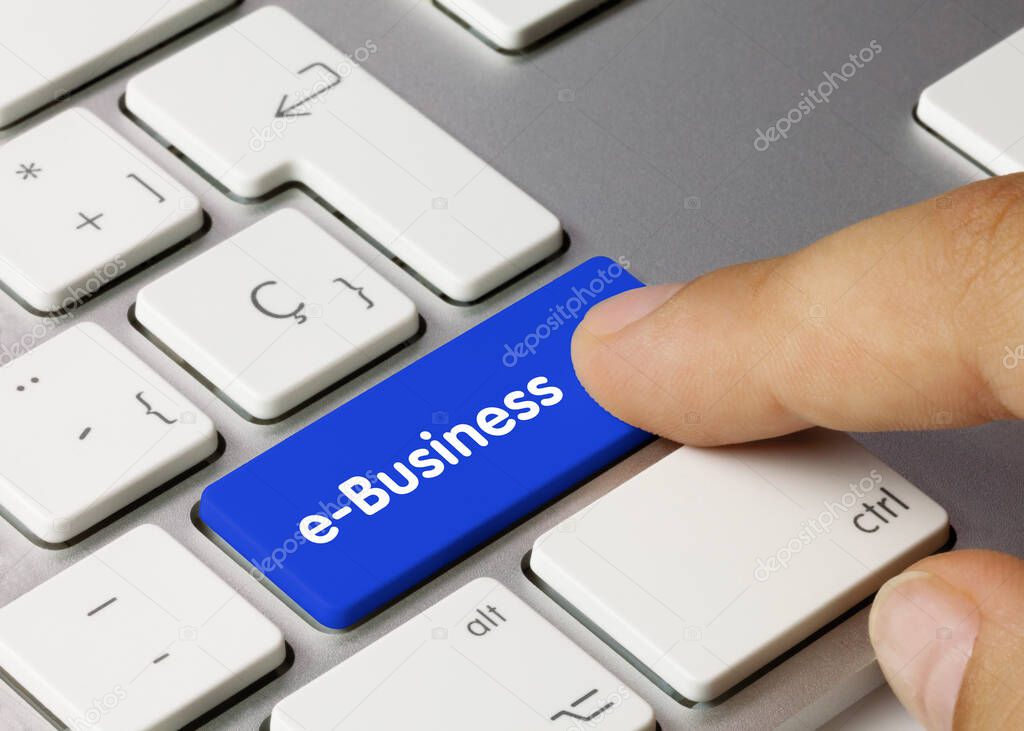 e-Business Written on Blue Key of Metallic Keyboard. Finger pressing key.