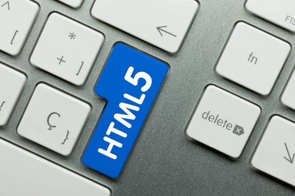 Html5写在金属键盘的蓝色键上 手指按键 — 图库照片