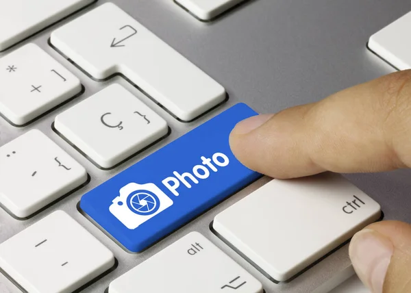 Photo Written Blue Key Metallic Keyboard Finger Pressing Key — Stock Photo, Image