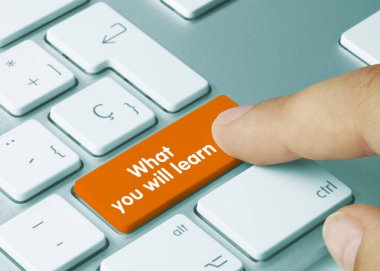 What you will learn Written on Orange Key of Metallic Keyboard. Finger pressing key. clipart