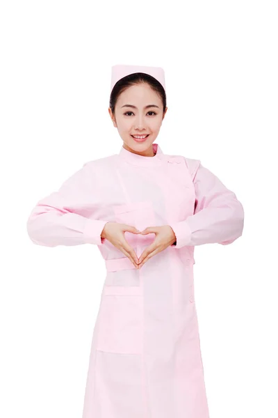 Young Female Nurses Make Heart Gesture — Stock Photo, Image