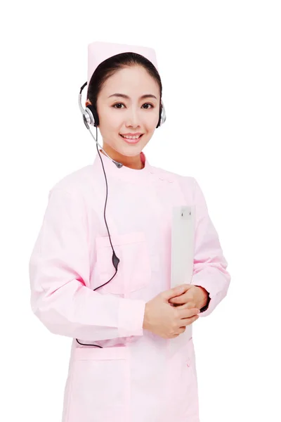 Den Unga Kvinnliga Sjuksköterskan Bär Headset — Stockfoto