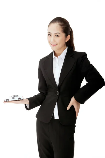 Business Woman Holding Model Car — Stock Photo, Image