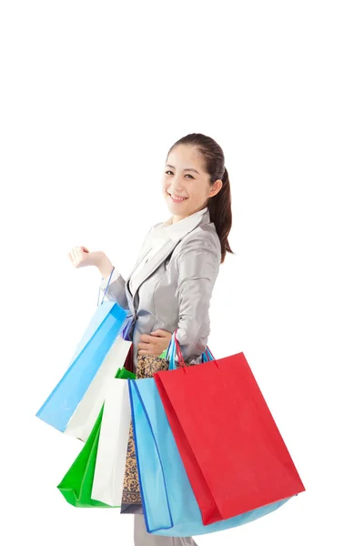 Kadını Beyaz Arka Planda Alışveriş Yapıyor — Stok fotoğraf