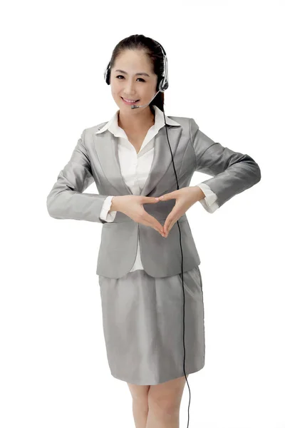 Geschäftsfrau Macht Herzensgeste — Stockfoto