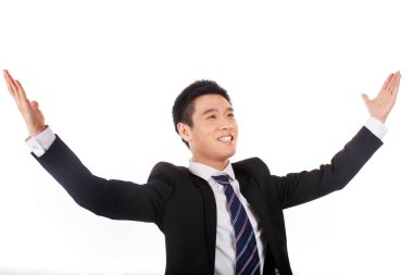 İşadamı, beyaz arkaplan önündeki başarısından dolayı heyecanlı.