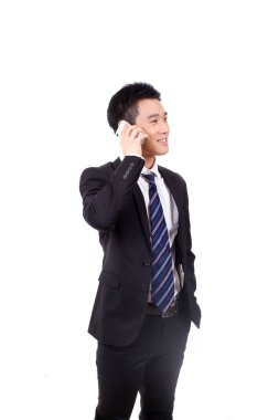 Cep telefonuyla ayakta duran bir iş adamının portresi