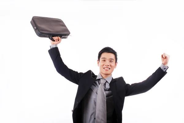 バッグを持っているビジネスマンをジャンプ — ストック写真