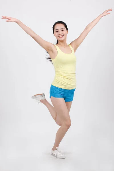 Eine Junge Frau Trainingsanzug Zeigt Andere Gefühle — Stockfoto