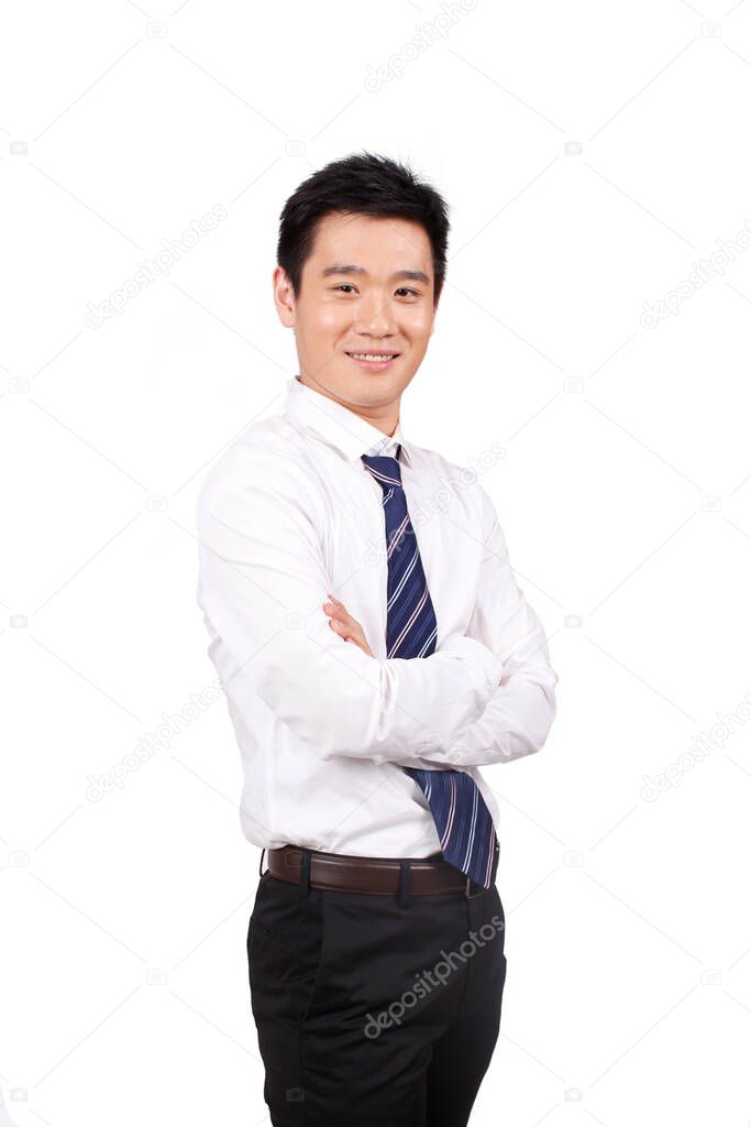 	Portrait of a businessman standing with arms akimbo	