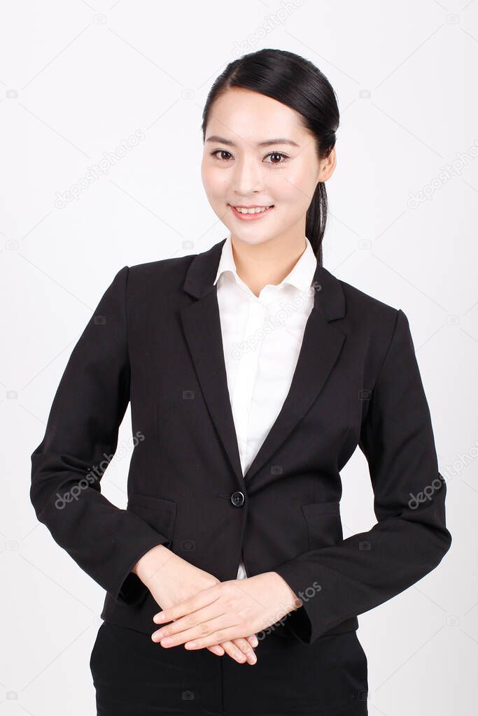 A young business woman standing in different positions