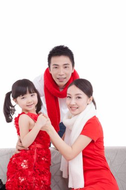 Bahar Festivali 'ni kutlayan anne babayla kızının portresi.