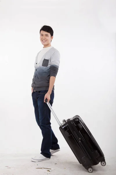 Portrait Young Bisinessman Pulling Valise — Stock Photo, Image