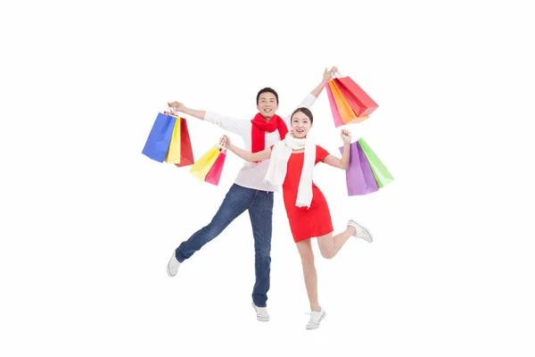 Retrato Pareja Joven Sosteniendo Bolsas Compras —  Fotos de Stock