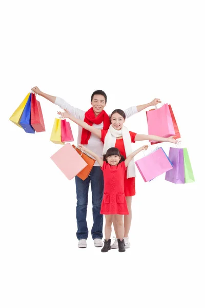 Portrait Daughter Parents Holding Shopping Bags Opening Arms — Stock Photo, Image