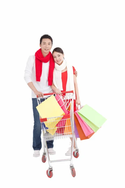 Retrato Pareja Joven Empujando Carrito Compra Con Bolsas Compra — Foto de Stock