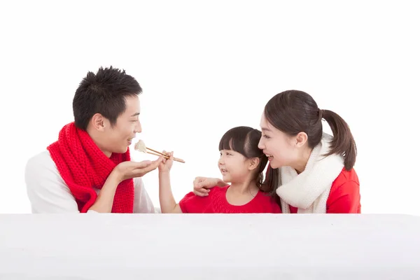 Portrait Daughter Giving Dumpling Father Mother Looking Celebrating Spring Festival — Stock Photo, Image