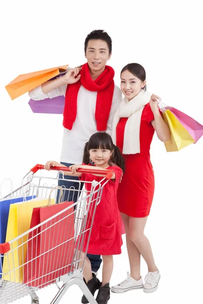 Portrait Daughter Pushing Shopping Cart Parents Holding Shopping Bags — Stock Photo, Image