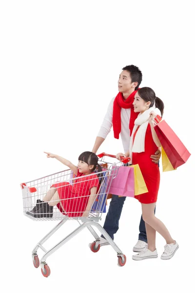 Portrait Daughter Sitting Shopping Cart Father Pushing Shopping Cart Mother — Stock Photo, Image