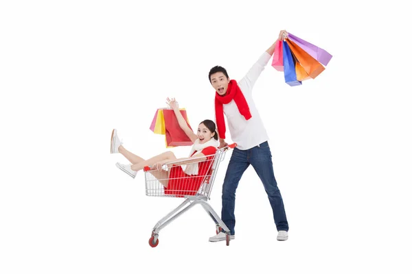 Portrait Wife Sitting Shopping Cart Husband Pushing Shopping Cart Holding — Stock Photo, Image