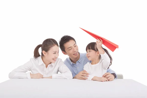 Portrait Daughter Playing Paper Plane Parents — Stock Photo, Image