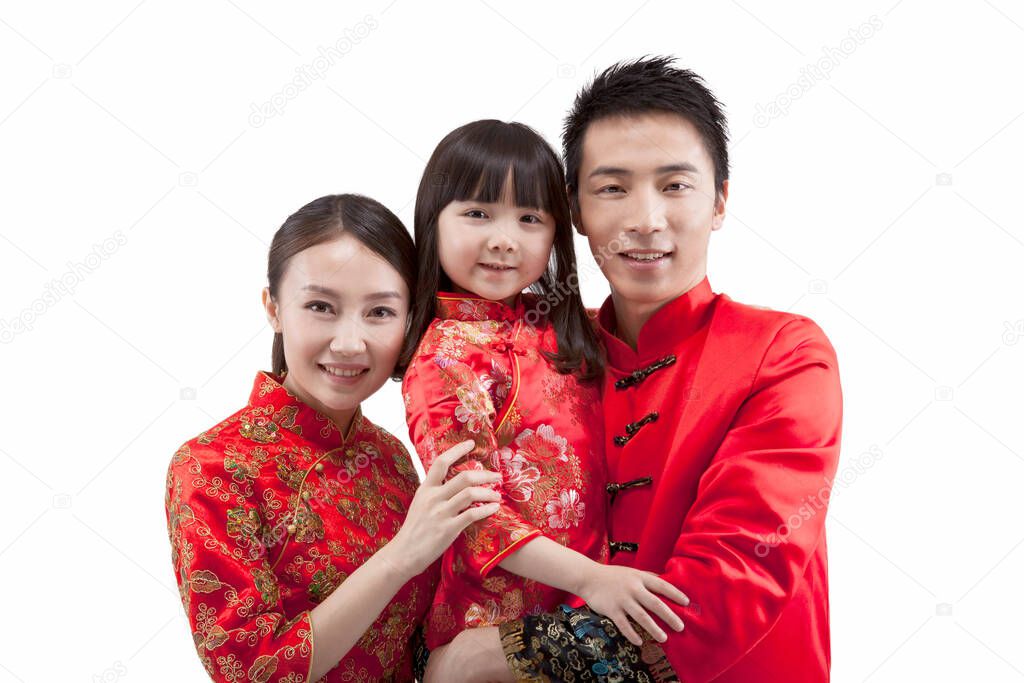 	Portrait of daughter with parents in Tang suits 	