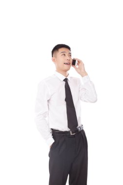 Cep telefonu kullanan bir iş adamı.