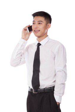 Cep telefonu kullanan bir iş adamı.