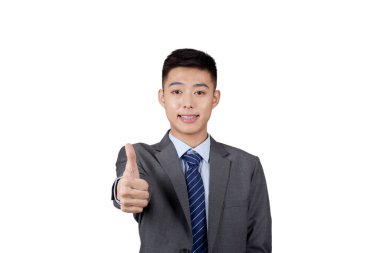 Baş parmağı havada bir iş adamı.