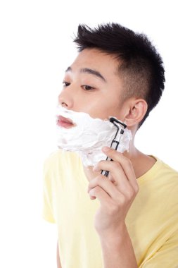 Tıraş olan genç adamın portresi