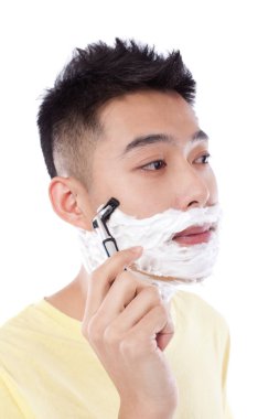 Tıraş olan genç adamın portresi