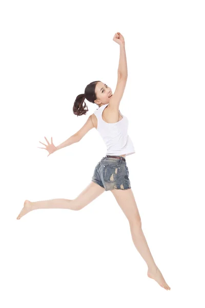 年轻女子在白色背景上跳跃 — 图库照片