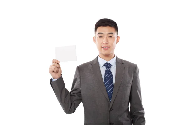 Geschäftsmann Hält Leeres Papier Hoch — Stockfoto