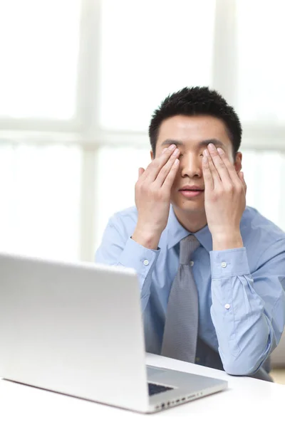 Portrait Young Businessman Doing Eye Exercises — Stock Photo, Image