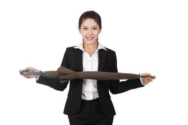 Şemsiye tutan iş kadını