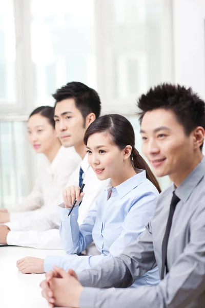 Executives Sitting Conference Table Focus Woman Foreground — стокове фото