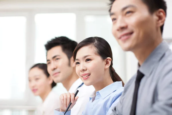 Executives Sitting Conference Table Focus Man Foreground — стокове фото