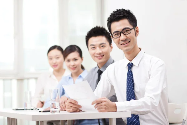 Executives Sitting Conference Table Focus Man Foreground — стокове фото