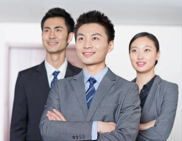 Four Young Office Workers Hands Crossed Indoors Portrait — Stock Photo, Image