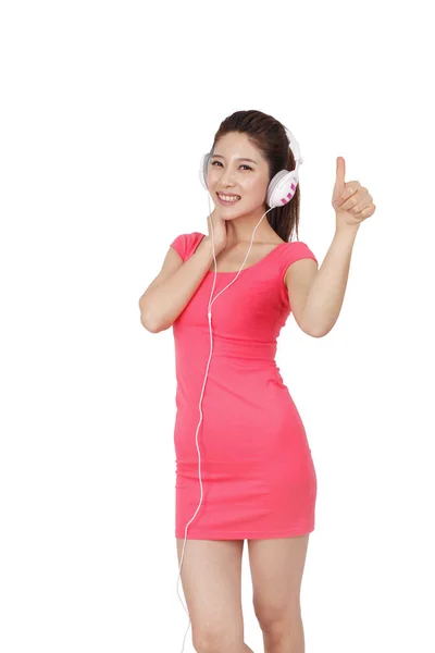 Jonge Vrouw Roze Jurk Met Headset — Stockfoto