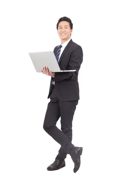 Asian Businessman Holding Laptop Computer — стокове фото