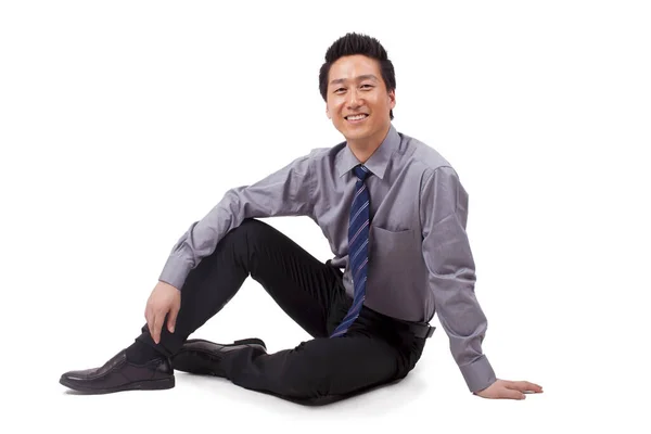 Succesvolle Jonge Man Zittend Vloer — Stockfoto