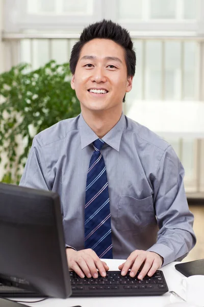 Businessman Using Laptop Phono Office — Stock Photo, Image