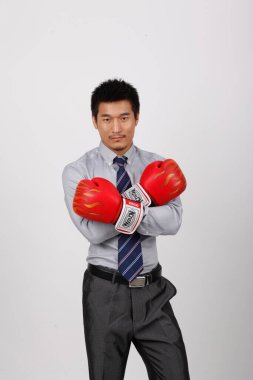 Kırmızı eldivenli bir iş adamı.