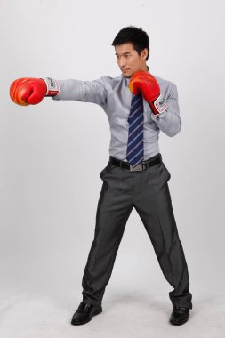 Kırmızı eldivenli bir iş adamı.