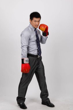 Kırmızı eldivenli bir iş adamı.