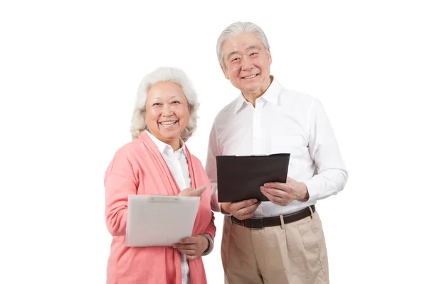 Senior Couple Holding Questionnaire — Stock Photo, Image